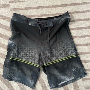 Ocean Current Black and Gray Board Shorts with Green Accents